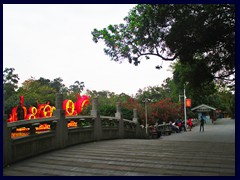 Yuexiu Park (Yuexiu Gongyuan) is a large park in the North part of Yuexiu district, that covers and area of 860 000 sq m. Hills with walking paths, temples, lakes, colourful stuff sculptures, old gates, other structures and bridges can be seen. The ancient Zhenhai Tower pagoda is situated in the park. The Five Rams Sculpture, Ancient Wall, Sun Yat-sen memorial and Yuexiu Stadium can also be found in the park. We visited the park at sunset.